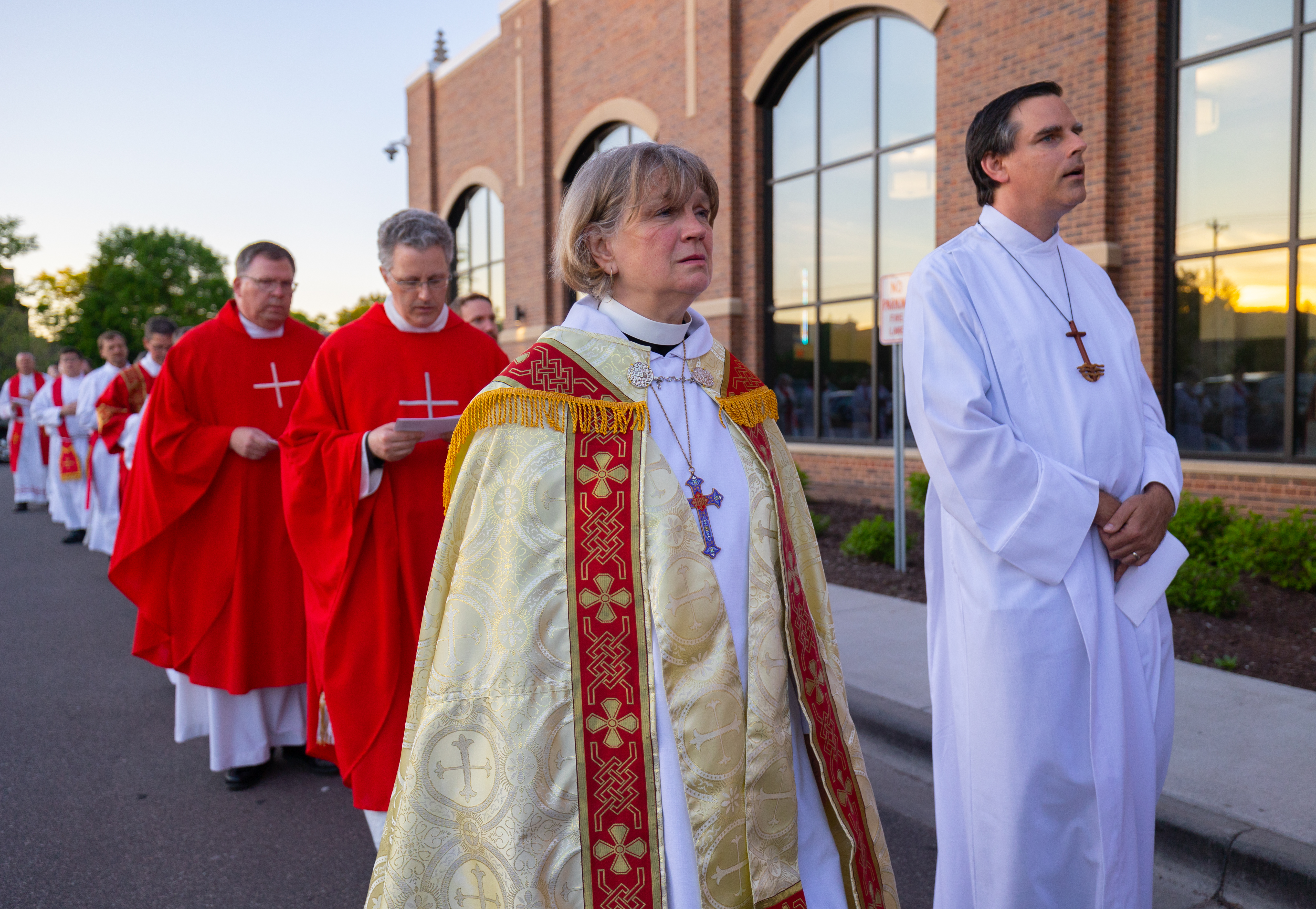 Bishop Anne Svennungsen of the Minneapolis Area Synod ELCA and Rev. Jerad Morey, Director of Strategic Relationships for Minnesota Council of Churches, take part in a worship procession at the Archdiocese of St. Paul and Minneapolis Synod