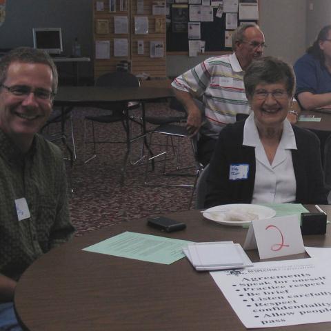 Burnsville Respectful Conversation table participants pose for picture